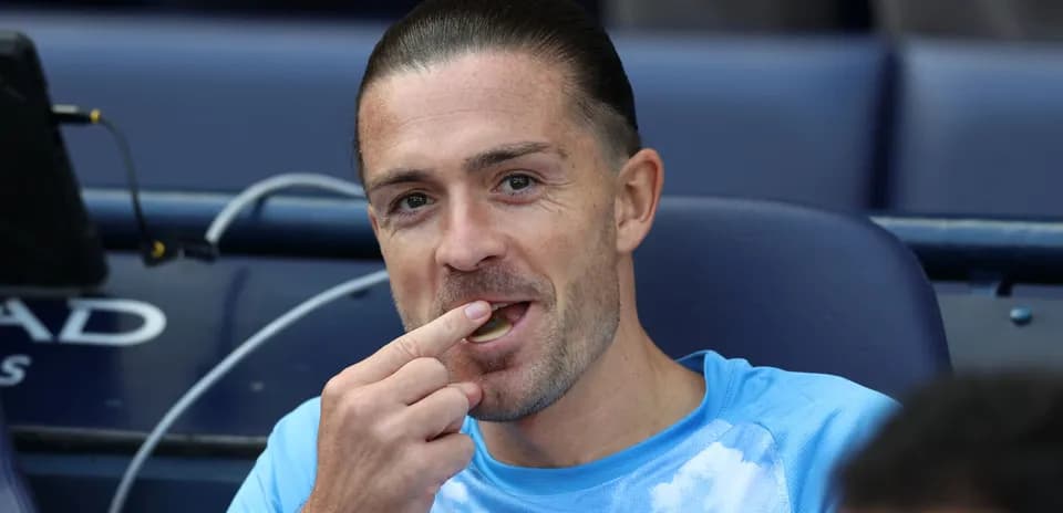 Player sitting on bench, eating before match