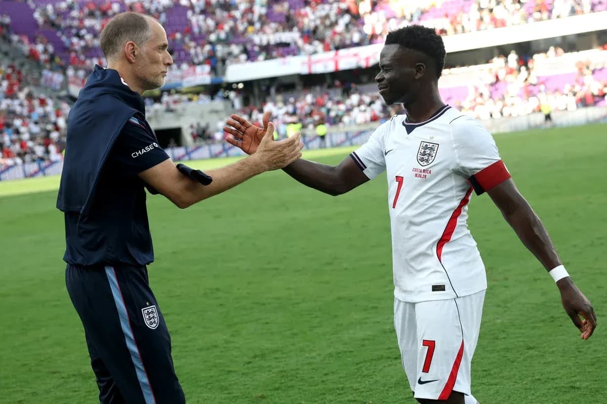 Coach and player shaking hands after match