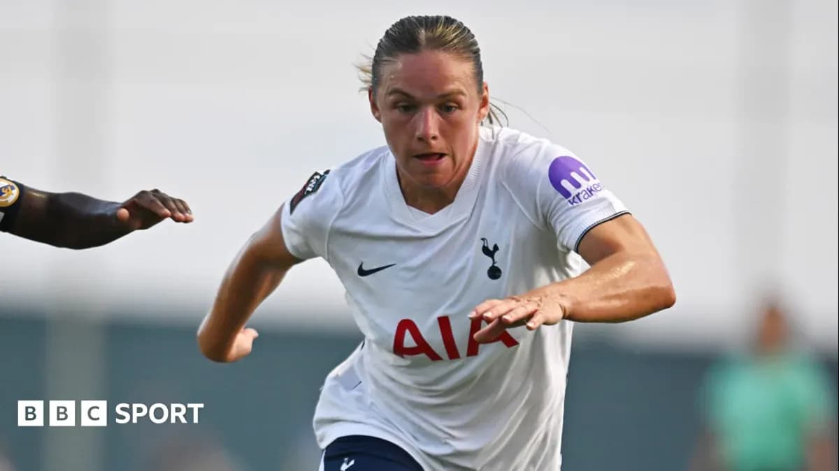 Player in Tottenham kit sprinting during match