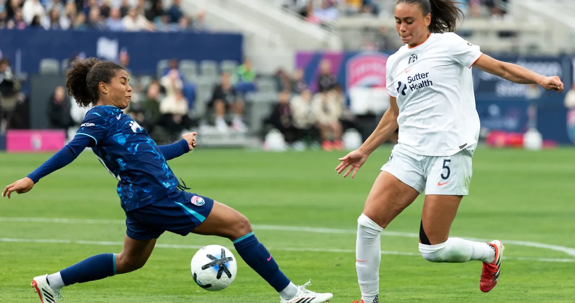 San Diego Wave player tackling Bay FC opponent