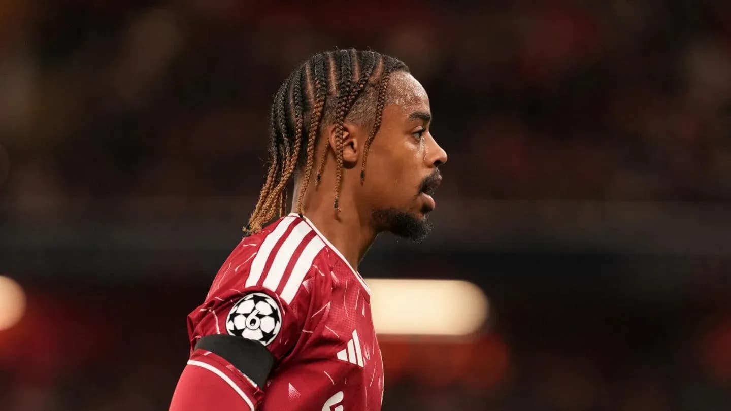 Player in red jersey during match profile view