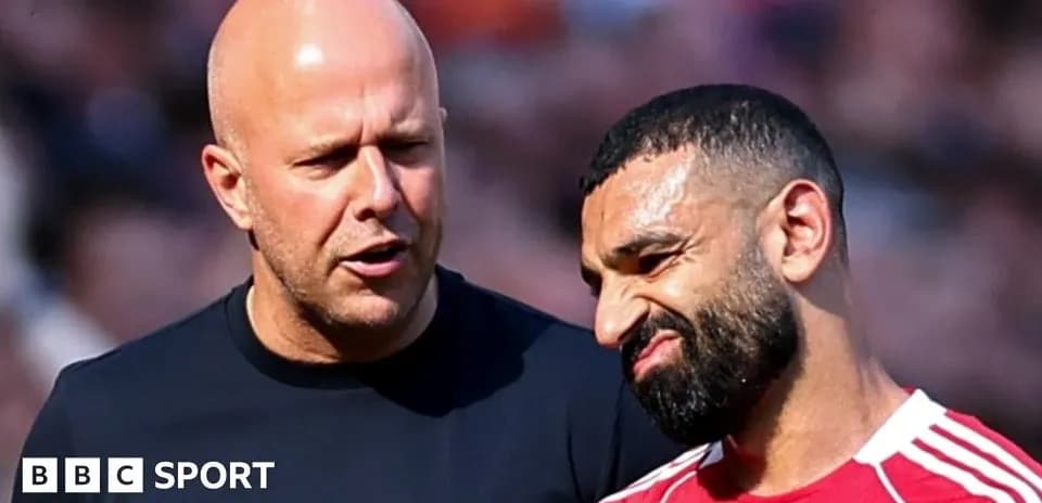 Coach and player discussing on the field
