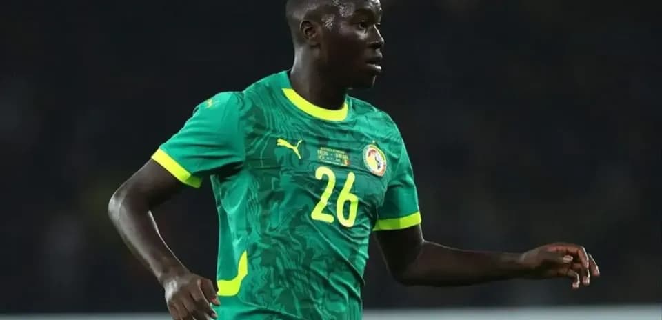 Senegal player in green jersey during match
