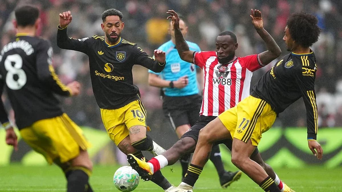 Players battling for the ball during match