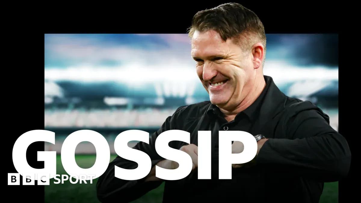 Man smiling during sports news segment