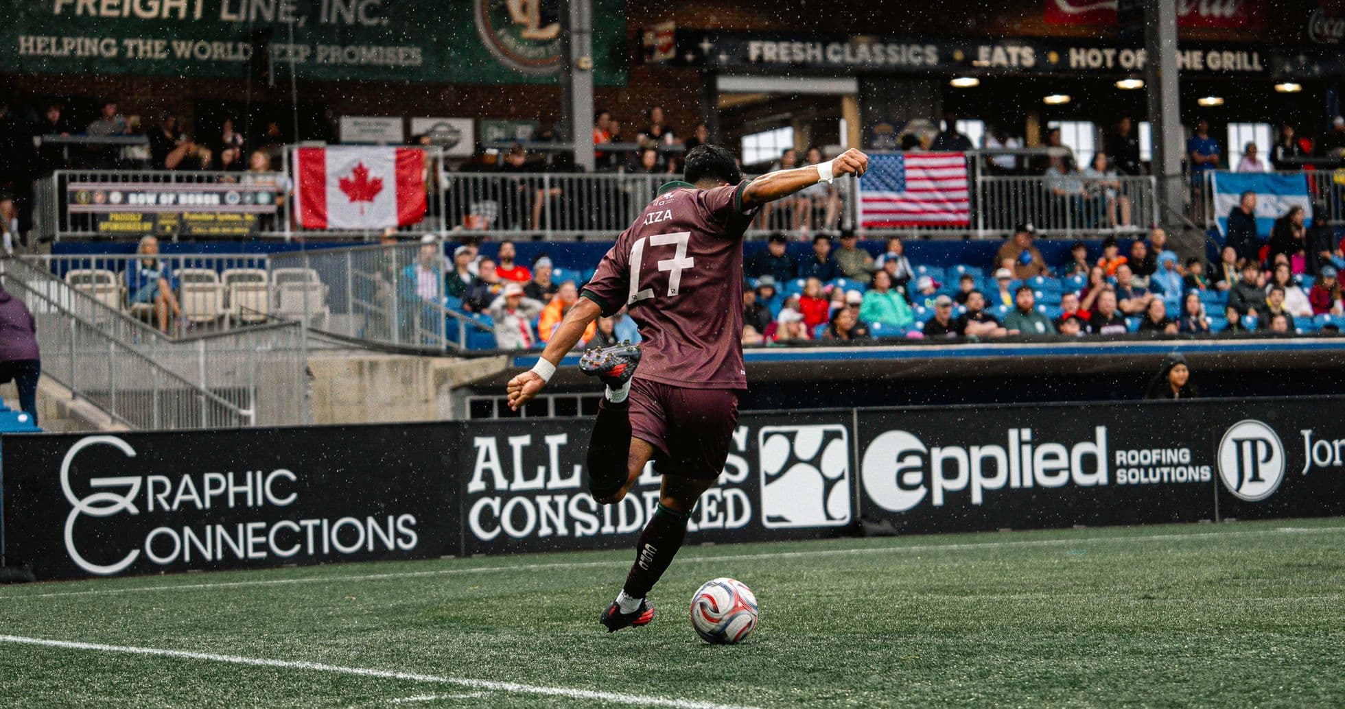 Player taking a corner kick during match