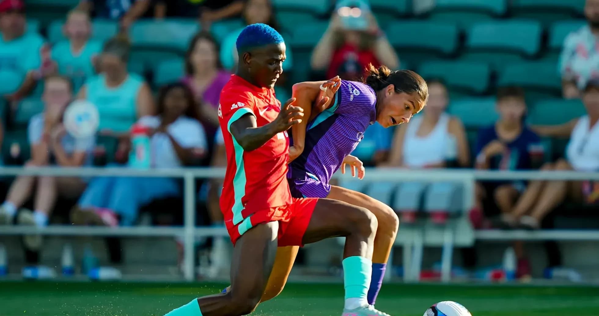 Players battling for the ball during match