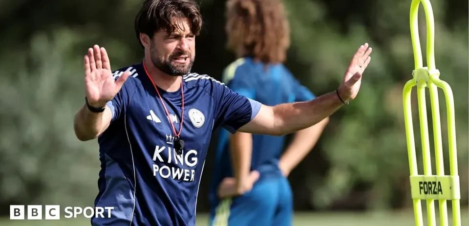 Coach giving instructions during training session