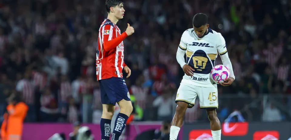 Chivas and Pumas players during Liga MX match