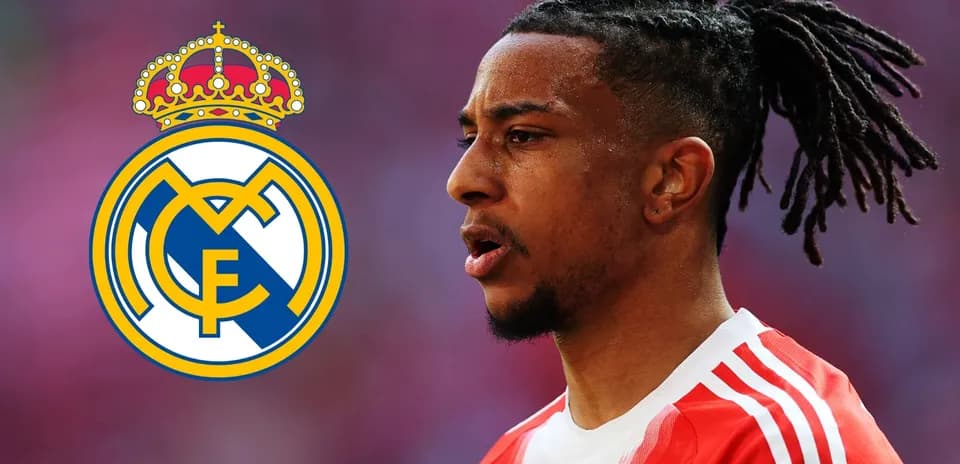 Player in red jersey near Real Madrid logo