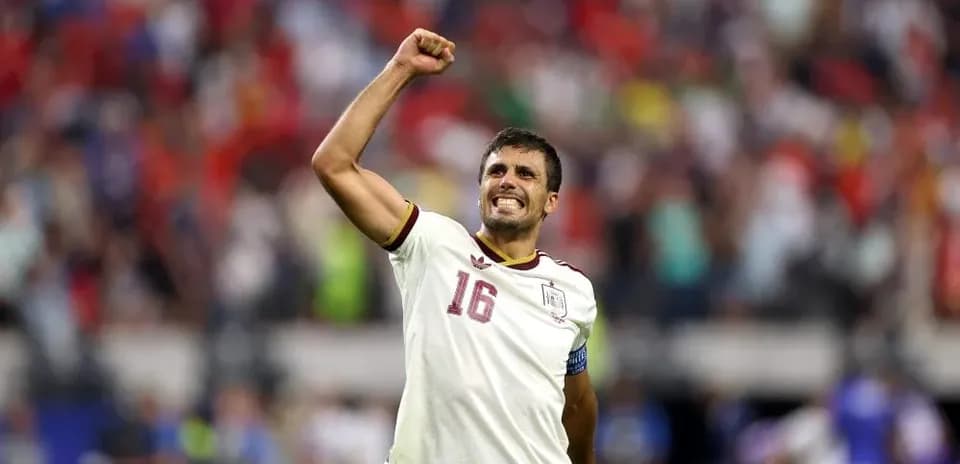 Player celebrating with raised fist after match