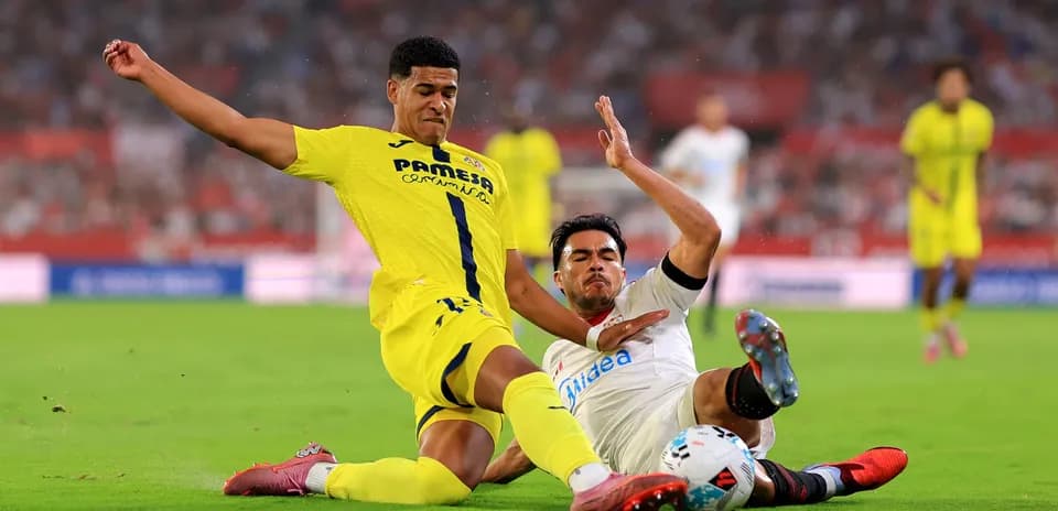 Players contesting for the ball during match