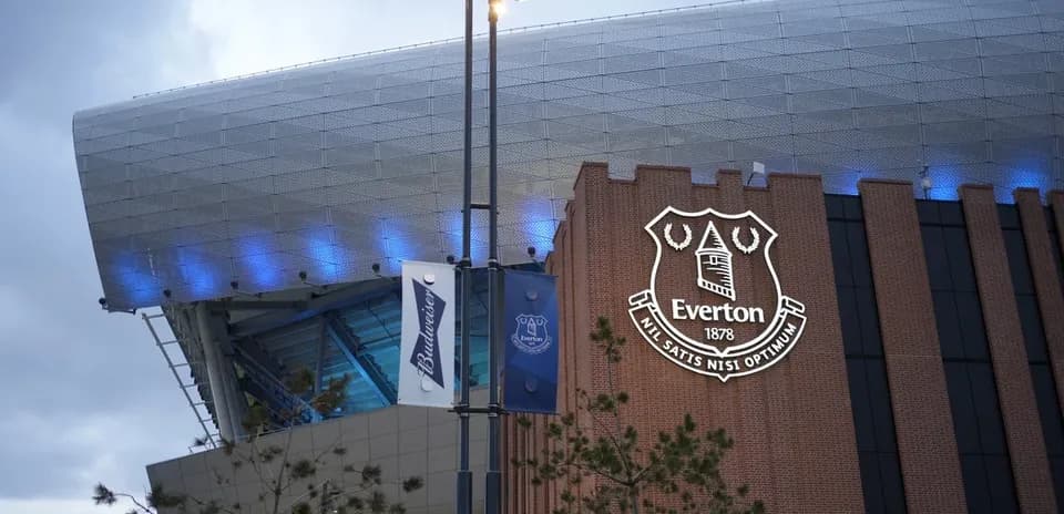 Everton stadium exterior with club logo displayed