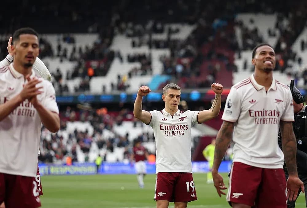 Arsenal players celebrating after a match