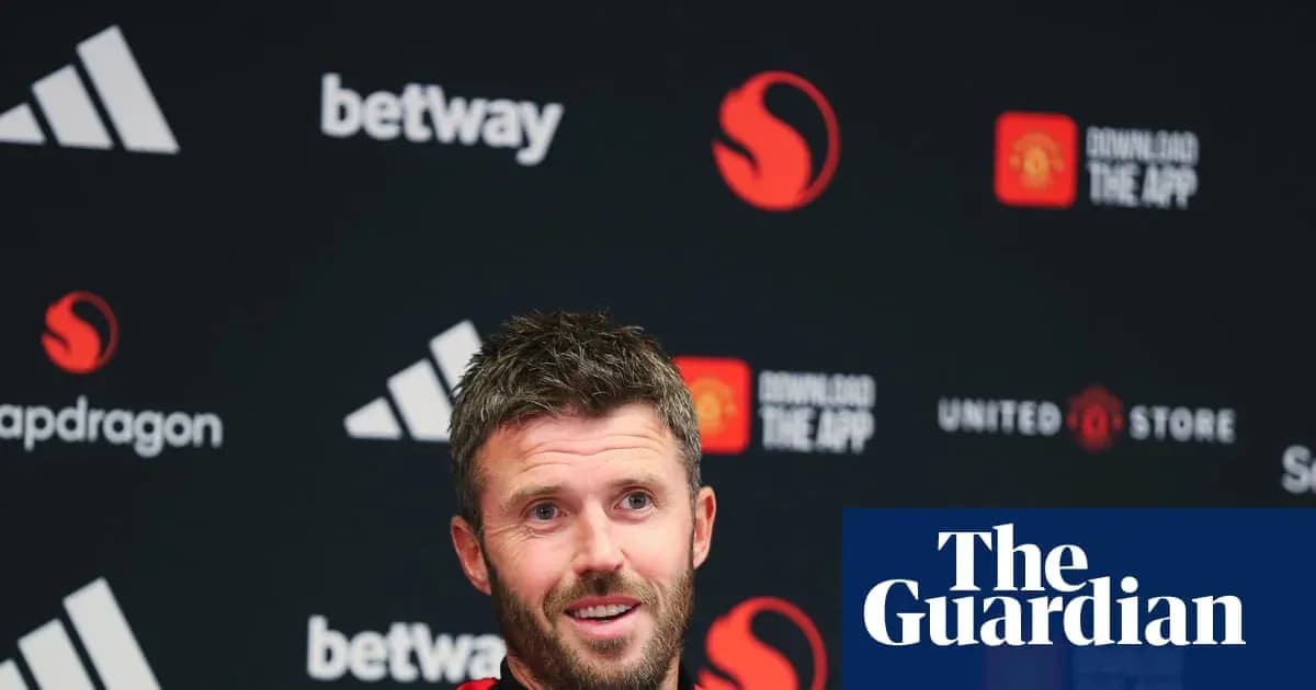 Manager speaking at press conference with logos behind