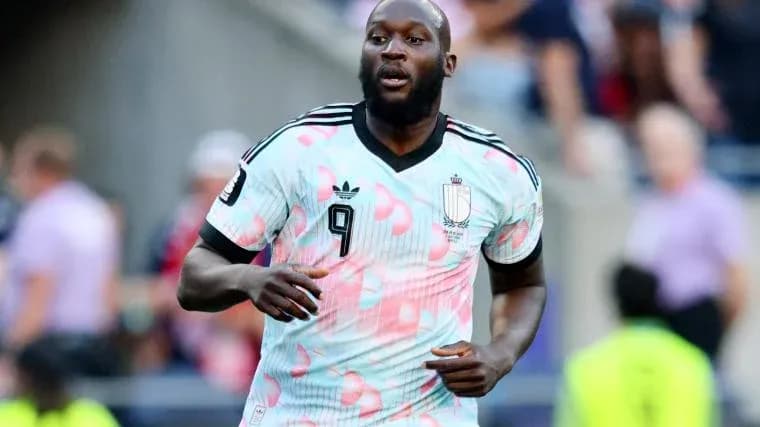 Player wearing Belgium kit running on the field