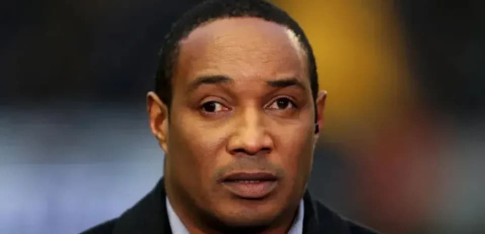 Man with serious expression in sports setting