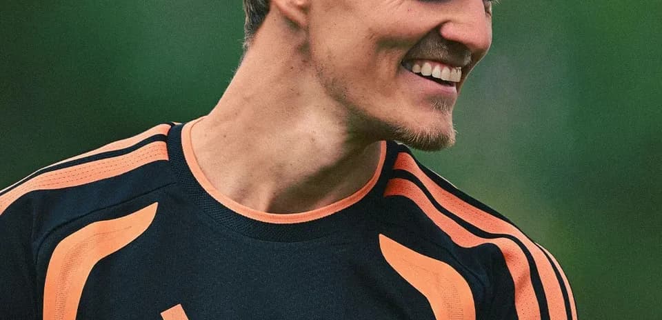 Player smiling in training kit during practice session