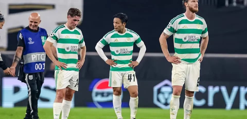 Celtic players looking dejected after match