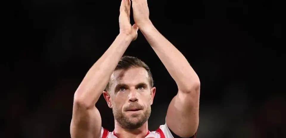 Player applauding fans after match conclusion