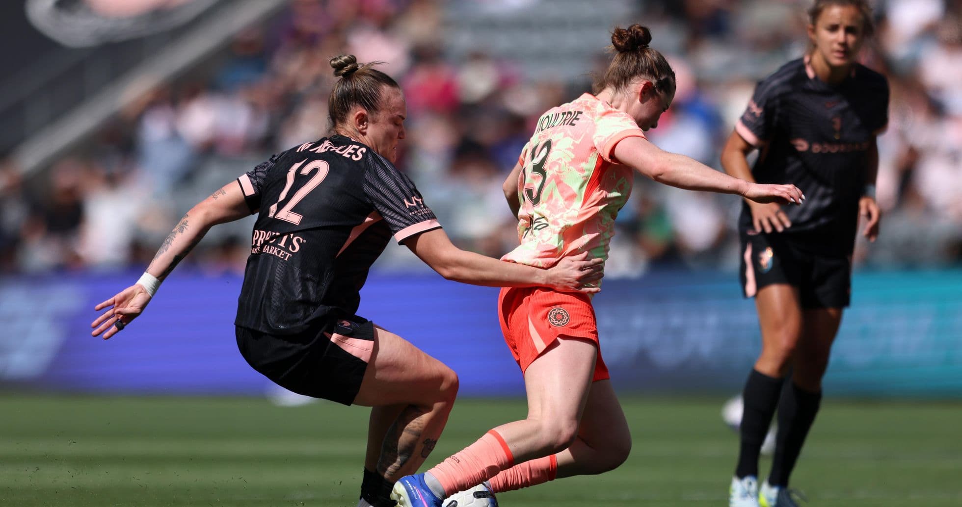 Portland Thorns player tackles Utah Royals opponent
