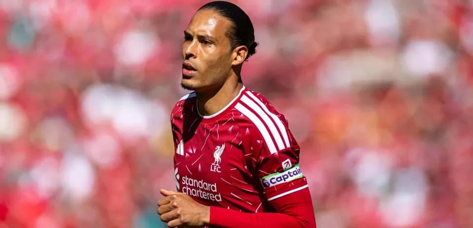 Player in Liverpool kit during match at stadium