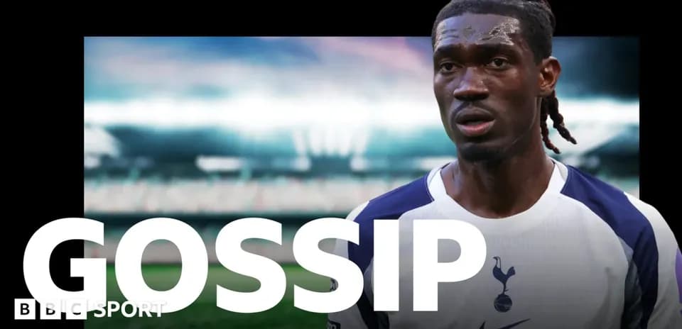 Player in Tottenham kit during match with stadium background