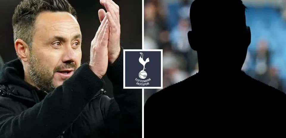 Manager applauding with Tottenham Hotspur logo displayed