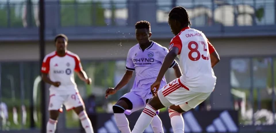 Toronto II player dribbling against Connecticut FC