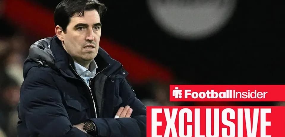 Manager observing match from the sidelines