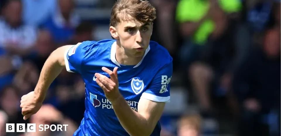 Player running during a football match for Portsmouth