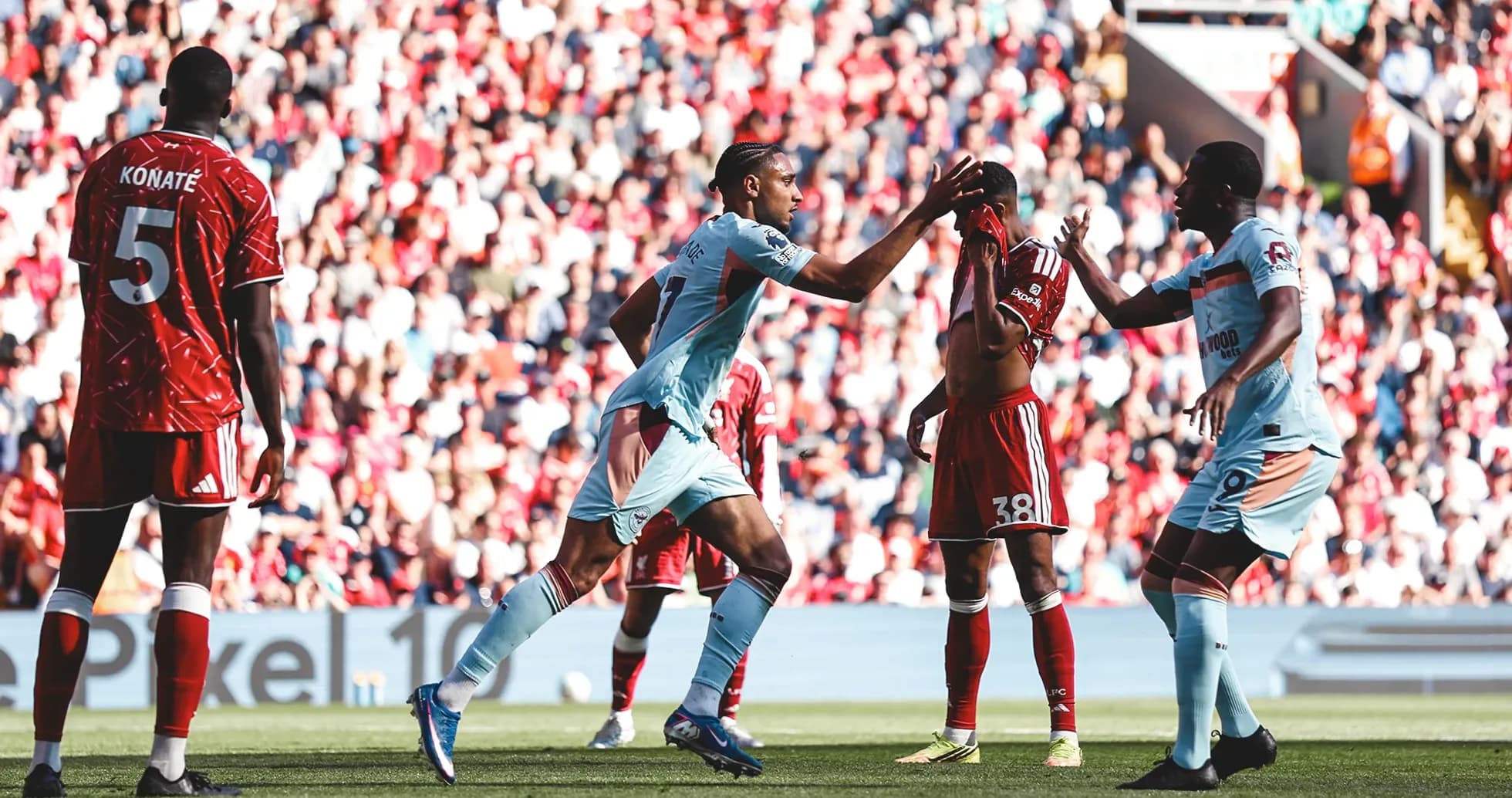 Players celebrating during Liverpool vs Brentford match