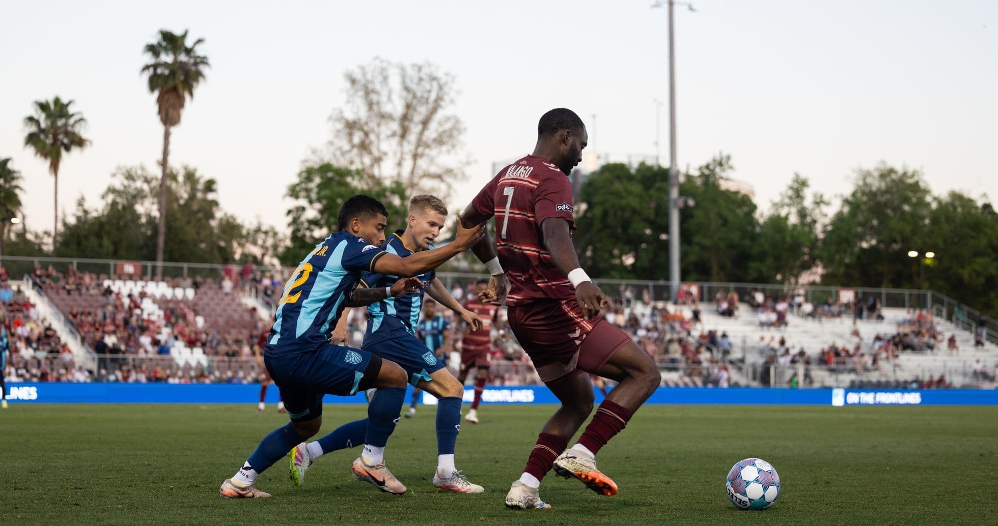 Players contesting the ball during a match