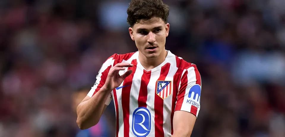 Atletico Madrid player gesturing on the field