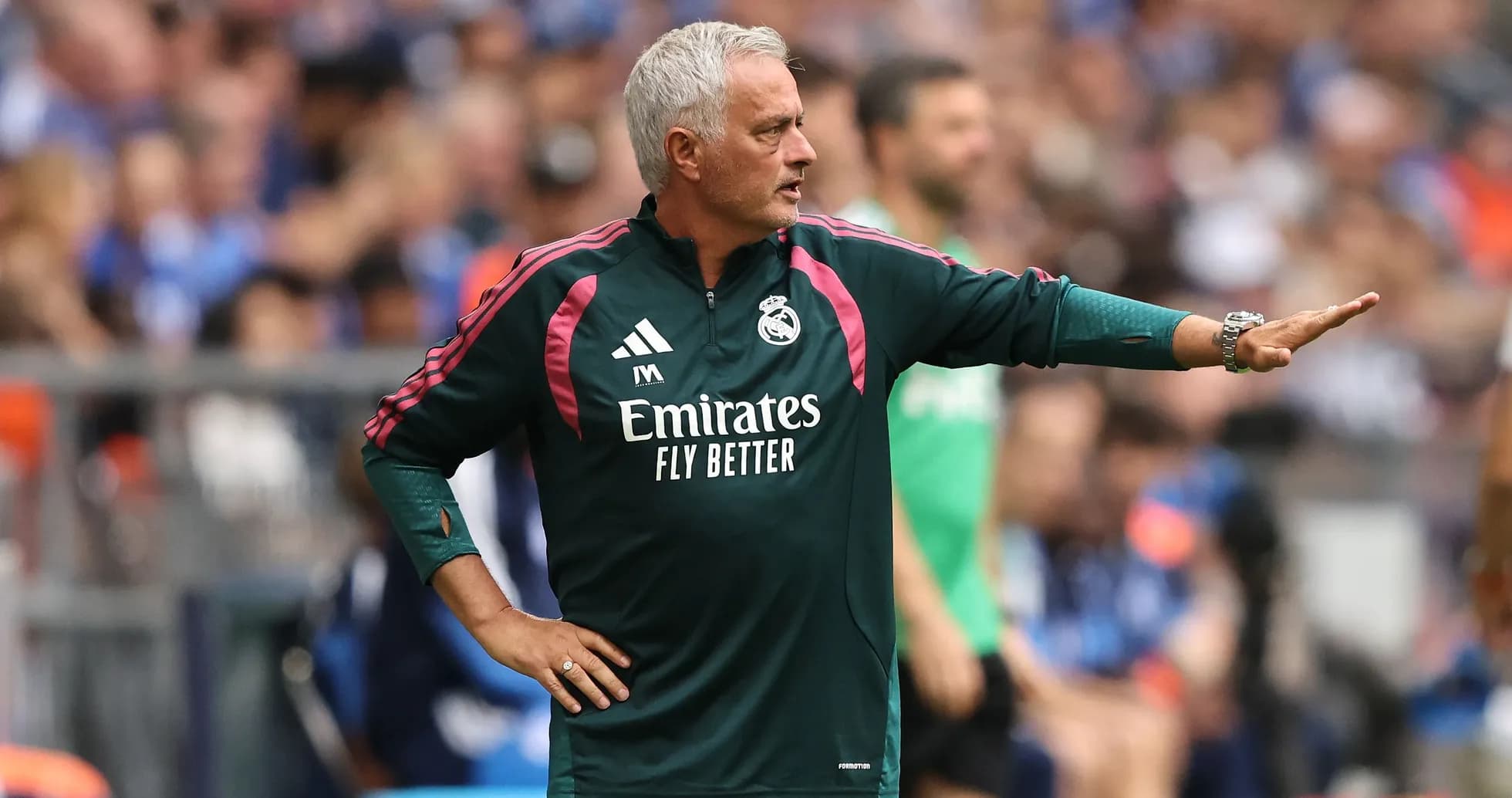 Manager directing players during a match