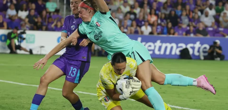 Goalkeeper saves the ball during Kansas City match