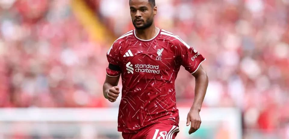 Player wearing Liverpool kit during match at Anfield