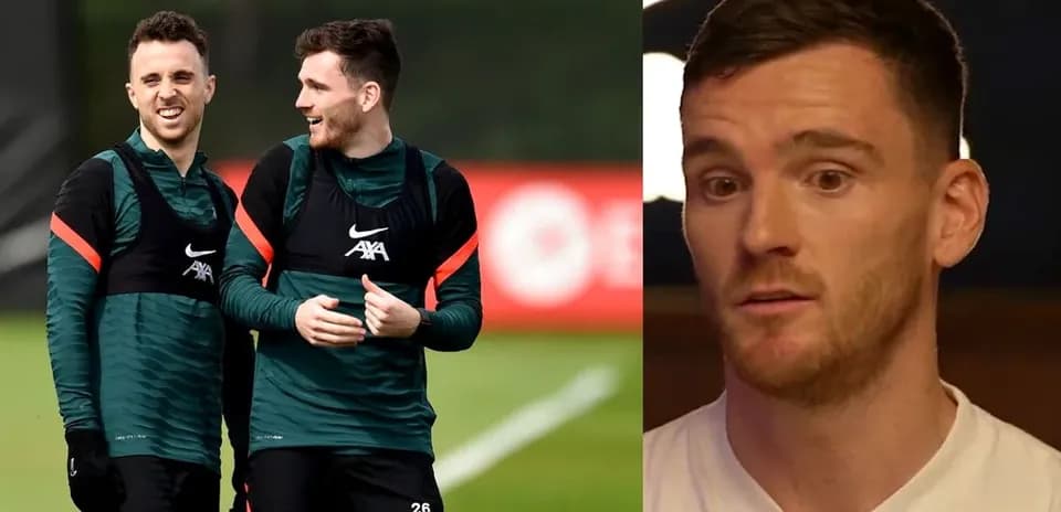 Two Liverpool players laughing during training session