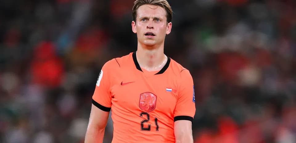 Player in orange jersey during match action