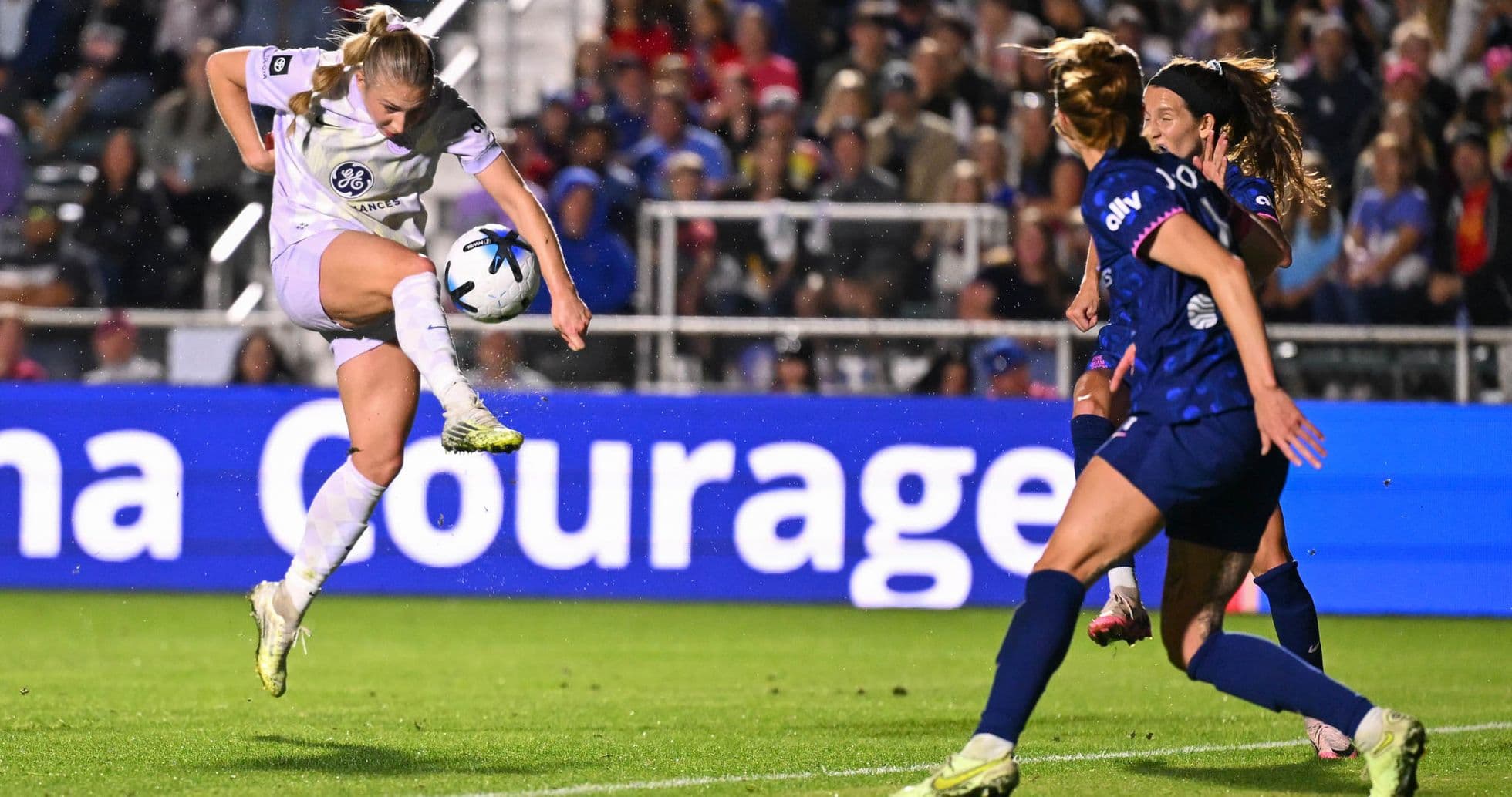 Player kicking ball during Racing Louisville match