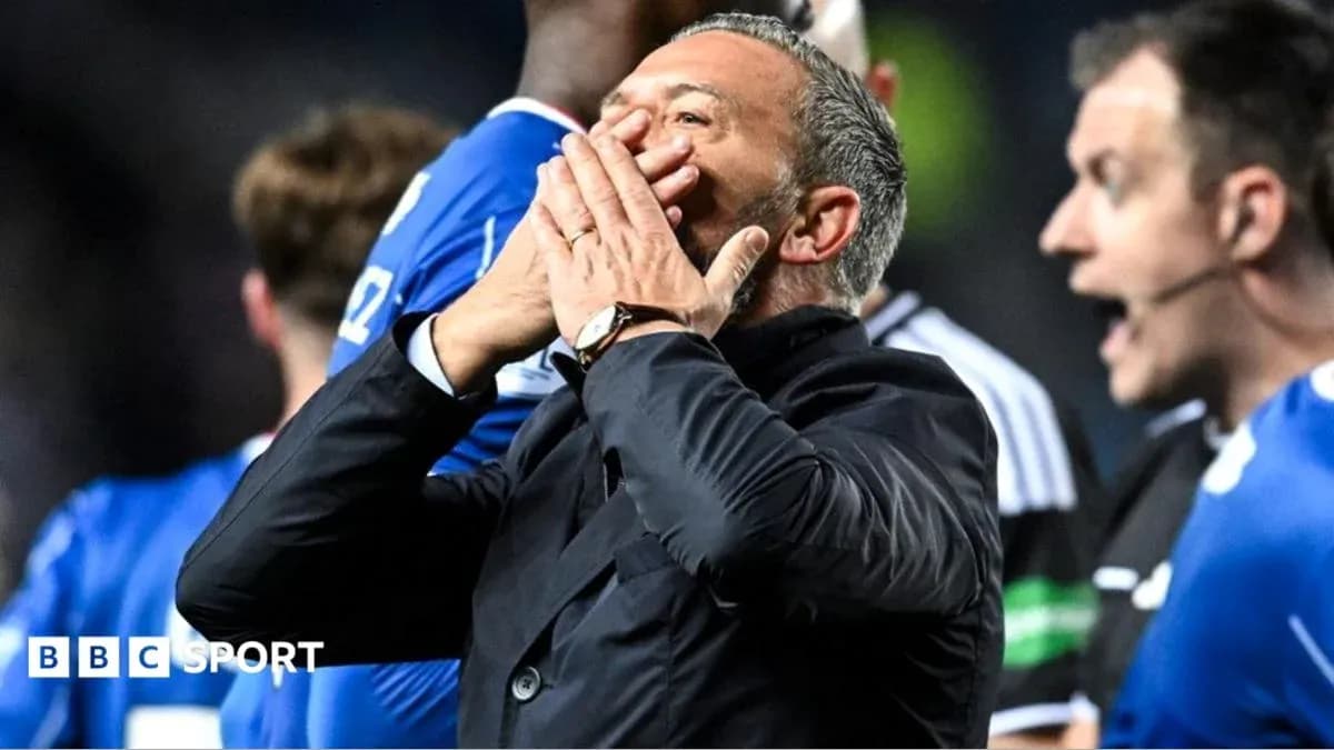 Manager gesturing during a heated match situation