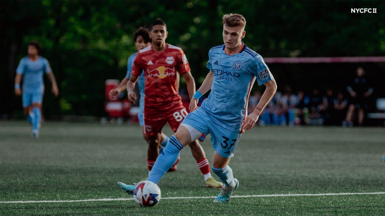 Player from NYC II taking a shot on goal