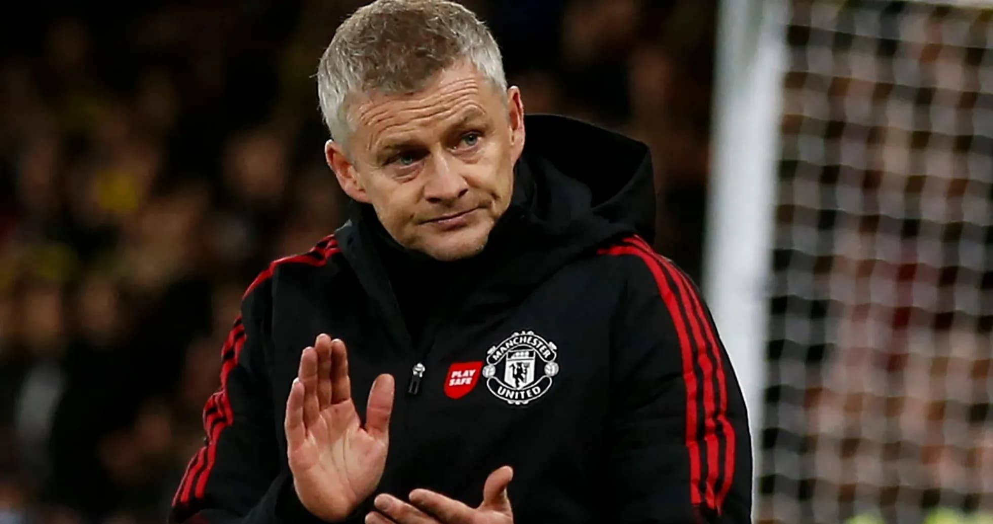Manager gesturing during a football match