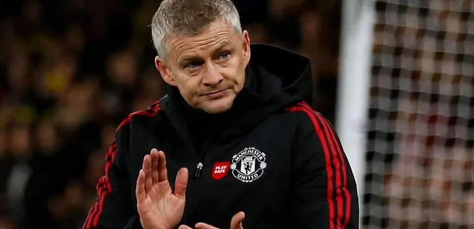 Manager gesturing during a football match