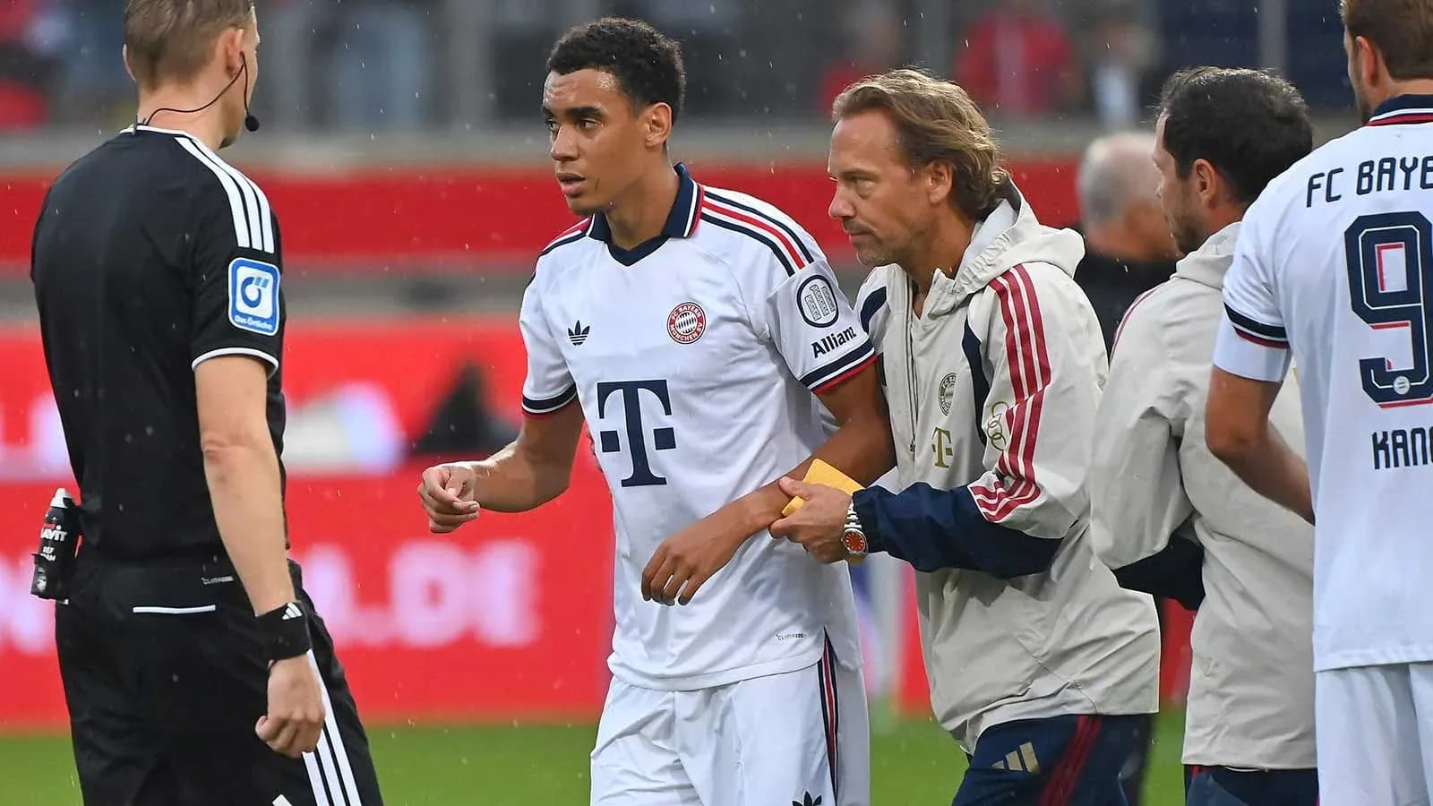 Bayern Munich player receiving attention from staff