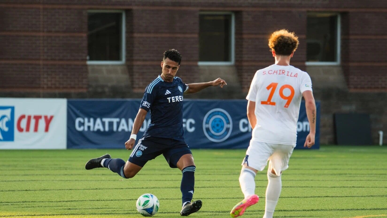 FC Cincinnati II player kicking the ball