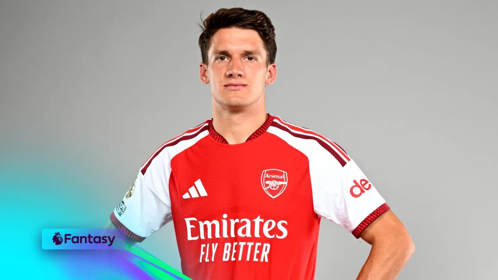 Player in Arsenal jersey posing for photo