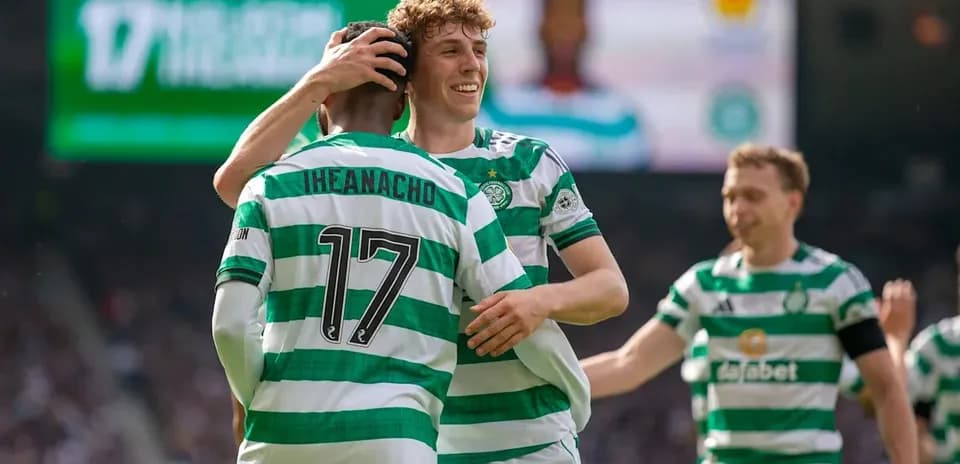 Celtic players celebrating a goal on the pitch
