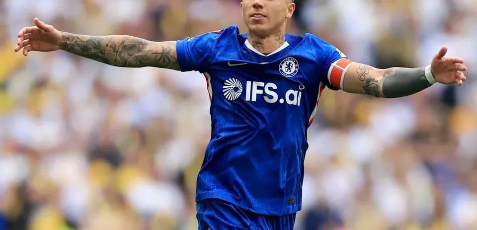 Player celebrating during a match in blue kit