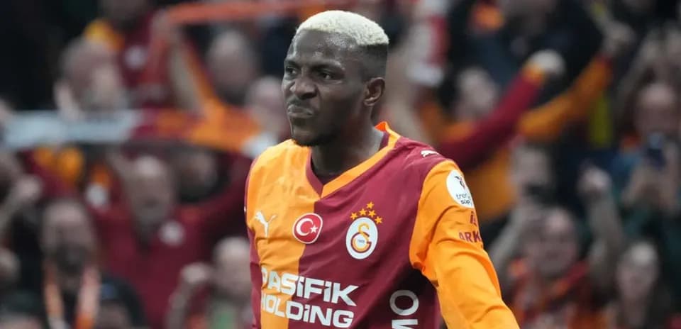 Player celebrating in Galatasaray jersey during match